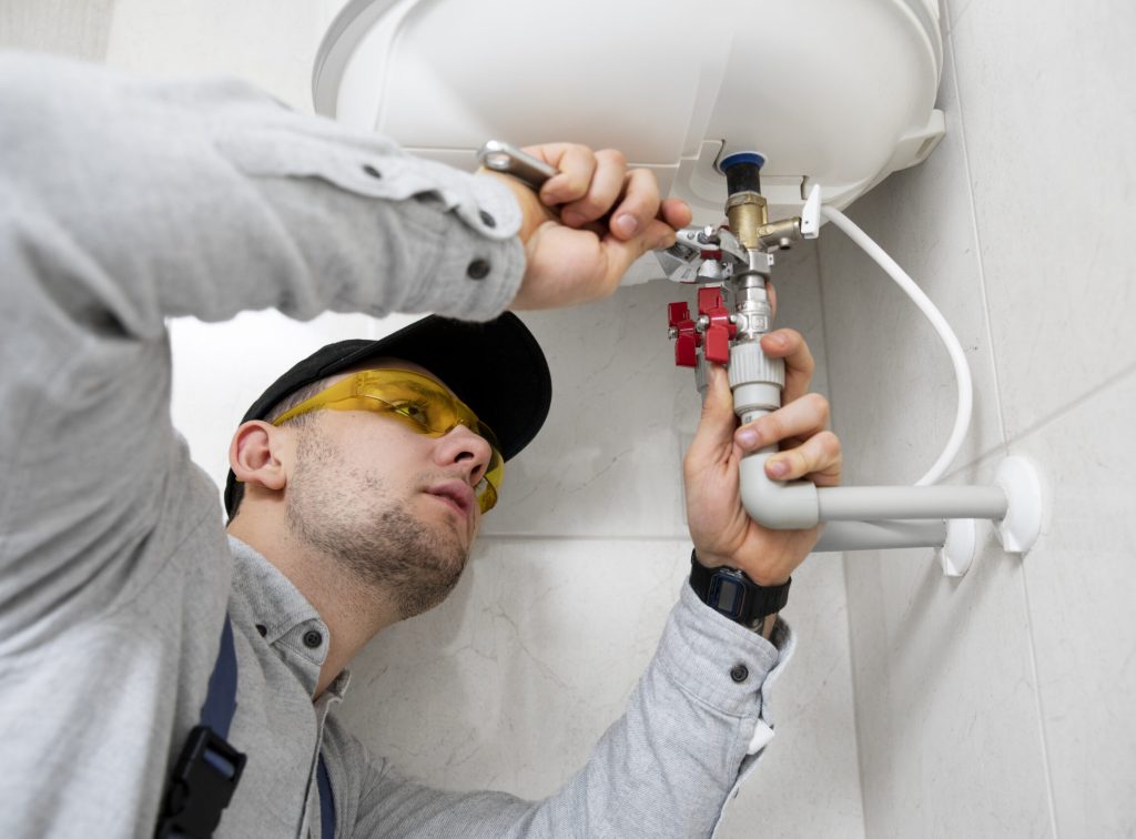 worker-repairing-water-heater(1)